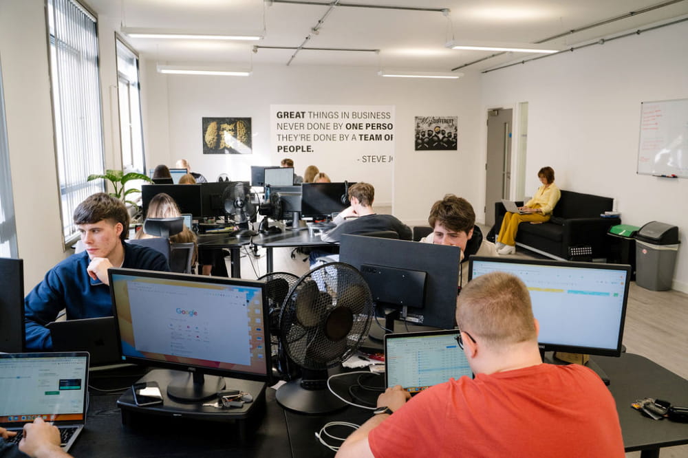 Quirky Digital's office with the team working on YMYL (your money your life) topics for SEO